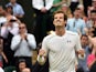 Britain's Andy Murray celebrates beating Canada's Vasek Pospisil during their men's quarter-final match on day nine of the 2015 Wimbledon Championships at The All England Tennis Club in Wimbledon, southwest London, on July 8, 2015