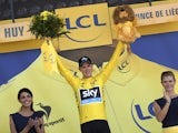Great Britain's Christopher Froome celebrates his overall leader yellow jersey on the podium at the end of the 159.5 km third stage of the 102nd edition of the Tour de France cycling race on July 6, 2015