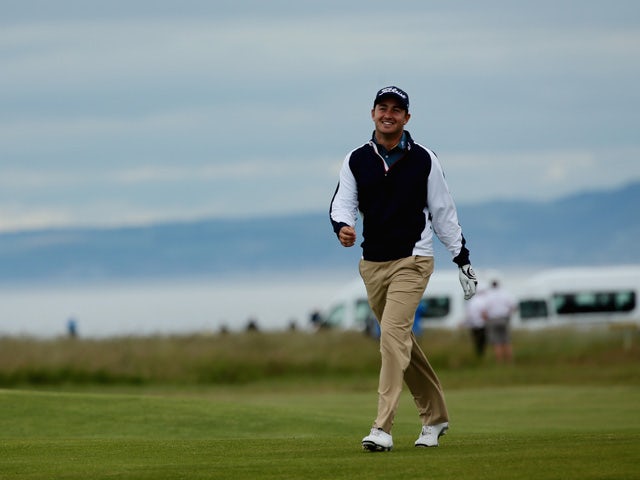 Daniel Brooks of England smiles on the 16th fairway during the second round of the Aberdeen Asset Management Scottish Open at Gullane Golf Club on July 10, 2015