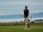Daniel Brooks of England smiles on the 16th fairway during the second round of the Aberdeen Asset Management Scottish Open at Gullane Golf Club on July 10, 2015