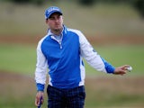 Daniel Brooks of England waves during the third round of the Aberdeen Asset Management Scottish Open at Gullane Golf Club on July 11, 2015