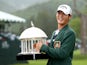 Danny Lee of New Zealand poses with the trophy after winning on the second hole of a sudden death playoff at the Greenbrier Classic held at The Old White TPC on July 5, 2015