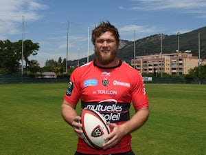 South African flanker Duane Vermeulen, poses in his new Rugby Club Toulon (RCT) jersey in the southern French city of Toulon, on June 18, 2015