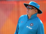 India's coach Duncan Fletcher watches his team during a training session ahead of their 2015 Cricket World Cup Group B match against Zimbabwe in Auckland on March 13. 2015