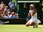 Garbine Muguruza of Spain celebrates after winning the Ladies Singles Semi Final match against Agnieszka Radwanska of Poland during day ten of the Wimbledon Lawn Tennis Championships at the All England Lawn Tennis and Croquet Club on July 9, 2015