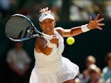 Garbine Muguruza of Spain plays forehand in the Final Of The Ladies' Singles against Serena Williams of the United States during day twelve of the Wimbledon Lawn Tennis Championships at the All England Lawn Tennis and Croquet Club on July 11, 2015