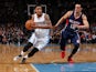 Gary Harris #14 of the Denver Nuggets controls the ball against John Jenkins #12 of the Atlanta Hawks at Pepsi Center on March 11, 2015