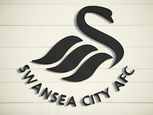 Swansea City sign Falkirk midfielder
