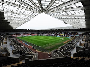 Axed Swansea coach retweets messages criticising club
