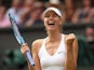 Maria Sharapova of Russia celebrates winning her Ladies Singles Quarter Final match against Coco Vandeweghe of the United States during day eight of the Wimbledon Lawn Tennis Championships at the All England Lawn Tennis and Croquet Club on July 7, 2015