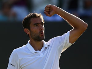 Marin Cilic eases into last 16