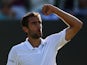 Marin Cilic of Croatia celebrates victory in his Gentlemen's Singles Fourth Round match against Denis Kudla of the United States during day seven of the Wimbledon Lawn Tennis Championships at the All England Lawn Tennis and Croquet Club on July 6, 2015