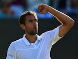 Marin Cilic of Croatia celebrates victory in his Gentlemen's Singles Fourth Round match against Denis Kudla of the United States during day seven of the Wimbledon Lawn Tennis Championships at the All England Lawn Tennis and Croquet Club on July 6, 2015