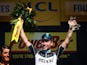 Mark Cavendish of Great Britain and Etixx-Quick Step celebrates his stage victory on the podium following stage seven of the 2015 Tour de France, a 190.5km stage between Livarot and Fougeres on July 10, 2015
