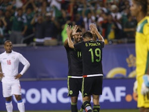 Peralta hat-trick guides Mexico to thumping win