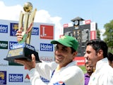 Pakistan cricket captain Misbah-ul-Haq poses with the trophy after his team's series victory following the third and final Test cricket match between Sri Lanka and Pakistan at The Pallekele International Cricket Stadium in Pallekele on July 7, 2015