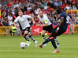 Papiss Cisse of Newcastle scores from the penalty spot in the first half during the pre season friendly between Gateshead and Newcastle United at Gateshead International Stadium on July 10, 2015