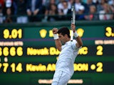 Serbia's Novak Djokovic celebrates winning the fourth set against South Africa's Kevin Anderson during their men's singles fourth round match on day seven of the 2015 Wimbledon Championships at The All England Tennis Club in Wimbledon, southwest London, o