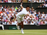 Novak Djokovic of Serbia plays a backhand volley in the Final Of The Gentlemen's Singles against Roger Federer of Switzerland on day thirteen of the Wimbledon Lawn Tennis Championships at the All England Lawn Tennis and Croquet Club on July 12, 2015