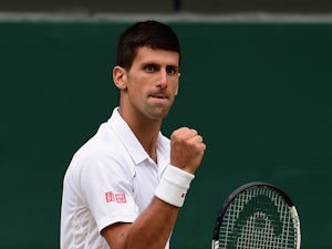 Djokovic eases into Wimbledon quarters