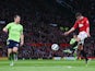 Robin van Persie of Manchester United scores his team's second goal during the Barclays Premier League match between Manchester United and Aston Villa at Old Trafford on April 22, 2013