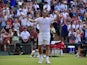 Switzerland's Roger Federer reacts after beating Spain's Roberto Bautista Agut during their men's singles fourth round match on day seven of the 2015 Wimbledon Championships at The All England Tennis Club in Wimbledon, southwest London, on July 6, 2015