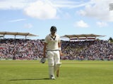 Shane Watson of Australia looks dejected after being dismissed LBW by Mark Wood of England during day four of the 1st Investec Ashes Test match between England and Australia at SWALEC Stadium on July 11, 2015 