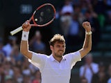 Stanislas Wawrinka of Switzerland celebrates victory in his Gentlemen's Singles Fourth Round match against David Goffin of Belgium during day seven of the Wimbledon Lawn Tennis Championships at the All England Lawn Tennis and Croquet Club on July 6, 2015