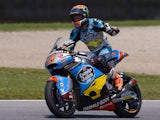 Spain's Tito Rabat celebrates on the track after winning the Italian Moto2 Grand Prix at the Mugello racetrack on May 31, 2015