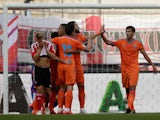 Players of Valencia celebrate after scoring their team's 2nd goal during the pre-season semi final 2 match between Southhampton FC and Valencia CF as part of the Audi Quattro Cup 2015 at Red Bull Arena on July 11, 2015