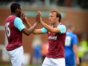 Mark Noble of West Ham United celebrates scoring their first goal during the Pre Season Friendly match between Peterborough United and West Ham United at London Road Stadium on July 11, 2015