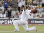 England's Andrew Flintoff celebrates after bowling Australia's Peter Siddle (not pictured) and gets five wickets on his final Ashes match at Lords during the Australian second Innings on the final day of the second Ashes Test match at Lord's cricket groun