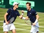 Andy Murray of Great Britain celebrates winning second set tie break with Jamie Murray of Great Britian against Nicolas Mahut and Jo-Wilfried Tsonga of France in the doubles match during Day Two of the World Group Quarter Final Davis Cup match between Gre