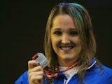 Charlotte Henshaw of Great Britain poses with her silver medal from the Women's 100m Breaststroke SB6 Final during Day Two of The IPC Swimming World Championships at Tollcross Swimming Centre on July 14, 2015