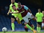 Dimitri Payet of West Ham United battles with Cian Bloger of Southend United during the pre season friendly match between Southend United and West Ham United at Roots Hall on July 18, 2015
