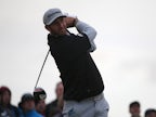 Play suspended as Dustin Johnson extends lead at The Open