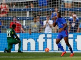 Nazon Duckens #20 of Haiti celebrates after scoring a goal against goalkeeper Donis Escober #22 of Honduras during the 2015 CONCACAF Gold Cup match at Sporting Park on July 13, 2015