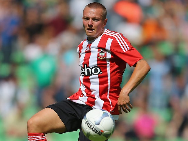 Jordy Clasie of FC Southampton runs with the ball during the friendly match between FC Groningen and FC Southampton at Euroborg Arena on July 18, 2015