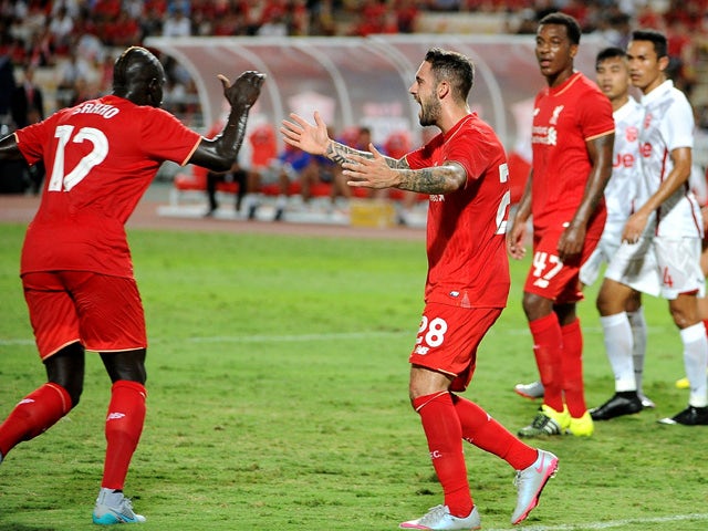 Mamadou Sakho of Liverpool (L) celebrates his goal during the international friendly match between Thai Premier League All Stars and Liverpool FC at Rajamangala Stadium on July 14, 2015