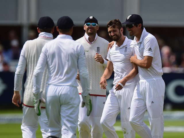 England players celebrate Mark Wood taking a wicket on day two of the second Ashes Test at Lord's on July 17, 2015