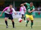 Norwich City midfielder Louis Thompson heads back to Swindon Town