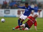Reece Brown of Birmingham City is challenged by Shane Byrne of Nuneaton Town during the pre season friendly match between Nuneaton Town and Birmingham City at the James Parnell Stadium on July 14, 2015 