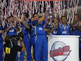 Adam Hollioake, the Surrey captain, and the rest of the team celebrate with the trophy after the Surrey v Warwickshire Final of the Twenty20 competition at Trent Bridge on July 19, 2003