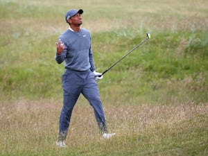 Tiger Woods plays down retirement talk