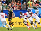 Trinidad and Tobago's Keron Cummings (C) celebrates scoring against Mexico during a CONCACAF Gold Cup Group C match in Charlotte, North Carolina, on July 15, 2015.