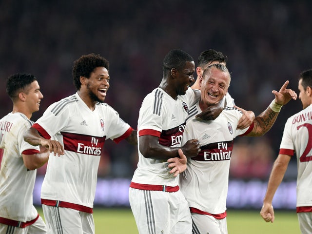 AC Milan's French defender Philippe Mexes celebrates with team mates after scoring a goal during the International Champions Cup football match between AC Milan and Inter Milan in Shenzhen on July 25, 2015