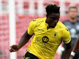 Micah Richards of Aston Villa moves away with the ball during the pre season friendly match between Swindon Town and Aston Villa at the County Ground on July 21, 2015