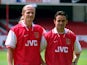Emmanuel Petit and Marc Overmars sign for Arsenal at Highbury in London on August 1, 1997