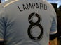 Fans wear Frank Lampard's jersey before the inaugural game of the New York City FC as they play the New England Revolution at Yankee Stadium on March 15, 2015