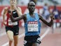 Kenya's Jairus Kipchoge Birech celebrates as he wins the men's 3000m steeplechase during the IAAF Diamond League athletics meeting at the Stade de France in Saint-Denis, outside Paris, on July 4, 2015